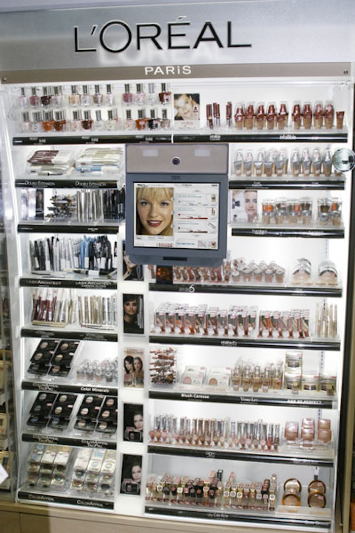 The Virtual Mirror Kiosk from IBM and EZFace allows consumers to “try on” cosmetics at the beauty counter.