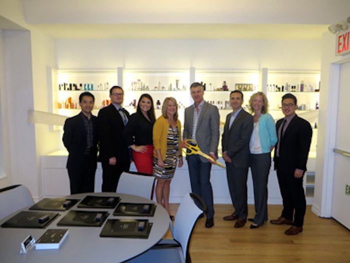 Celebrants gather in Fusion Packaging's new New York showroom; from left, Gary Zhang, VP of operations, Asia, Fusion Packaging; Alexander Kwapis, creative director, Fusion Packaging; Jessica Cahalen, director of marketing; Kim Jednachowski, account executive, GCI magazine; Derek Harvey, co-CEO, Fusion Packaging; Jonathan Gross, co-CEO, Fusion Packaging; Lesley Gadomski, VP of sales, Fusion Packaging; and David Lee, project engineer, Fusion Packaging.