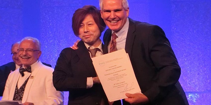 Shiseido's award winner, Tomonobu Ezure (center), at the IFSCC Congress.