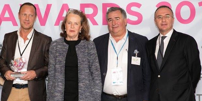 Francois Marchi, COO & managing director of Sytheon France accepting the award.