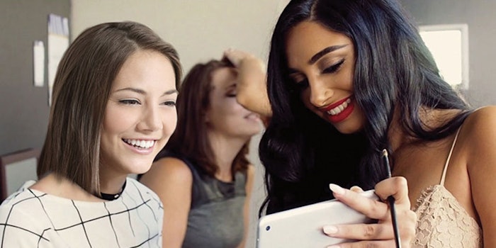 NYFW attendees tried on virtual makeup looks from fashion designers by using the Perfect365 app.