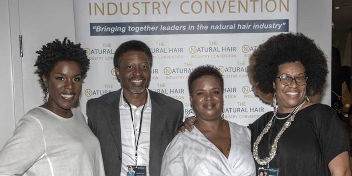Organizers of the natural hair industry convention Angela Walker (far left) and Susan Peterkin-Bishop (middle) pose with industry luminaries Cornell Mcbride, Jr. of Design Essentials and Bernard Bronner of the Bronner Bros International Beauty Show at the 4th Annual Natural Hair Industry Convention in Atlanta on Nov. 12th; Photo Credit: IndaHouse Media