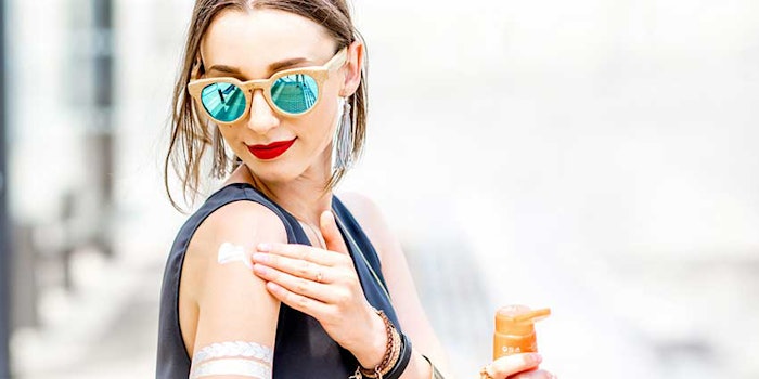womanapplyingsunscreen_425