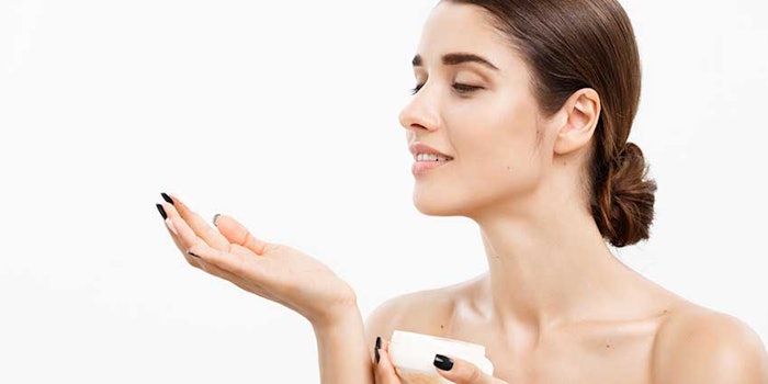 womanlookingatskincare_425