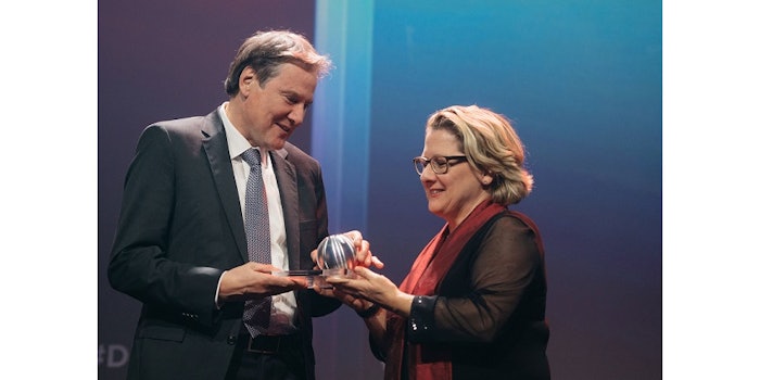 Heinz-Jürgen Bertram, CEO of Symrise, accepting the German Sustainability Award from German environmental minister Svenja Schulze.
