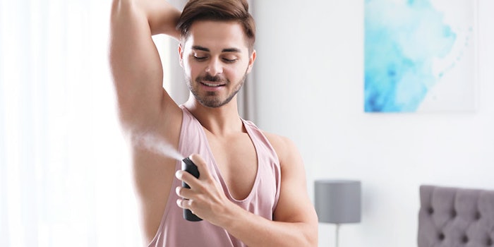 mansprayingdeodorant_425