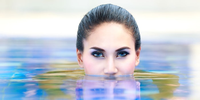 WomanEmergingWaterFace850x425