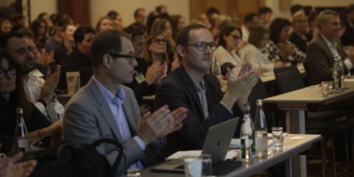 The audience applauds an award recipient during the 2019 Sustainable Beauty Awards.