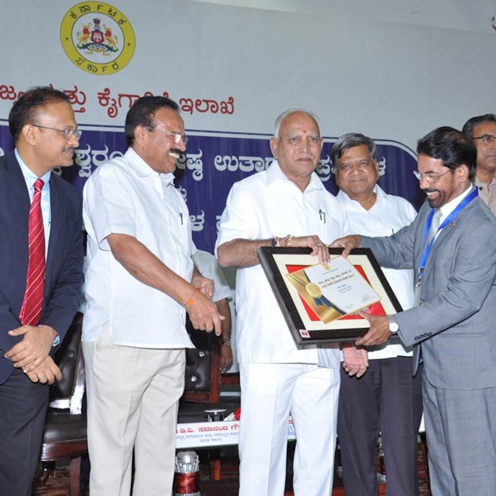 Shri V. G.Nair, CEO and director, Sami Labs Limited receiving the award for the Best Pharmaceutical Export Company of Tumkuru District from Shri B. S. Yediyurappa, chief minister of Karnataka. Left to right: Gaurav Gupta, IAS, principal secretary, industry and commerce, Government of Karnataka, Sadananda Gowda, minister for chemicals and fertilizers, Government of India, B. S. Yediyurappa, chief minister of Karnataka, Jagadish Shetter, industries minister, Government of Karnataka, Nair and Maheswara Rao, IAS, secretary, mining and MSME, Government of Karnataka.