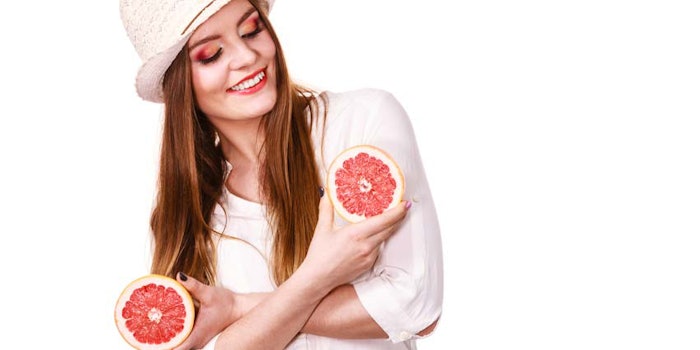 WomanFashionHoldingCitrus850x425