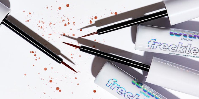 Lottie London's freckle tint temporary skin tint.