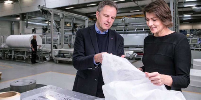 Mikael Staal Axelsen, group CEO Fibertex Personal Care and Innowo Print and Mette Due Søgaard, QA and sustainability director of Fibertex Personal Care, at the Aalborg site exploring ISCC Plus certified nonwovens.