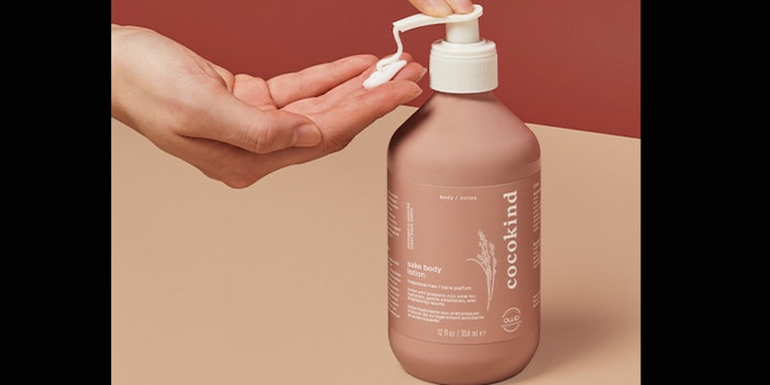 Cocokind's Sake body lotion housed in Ocean Waste Plastic.