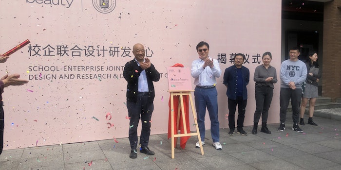 WWP Beauty APAC managing director William Jiang and APAC vice president Hua Zhong attended the unveiling ceremony held at the school.