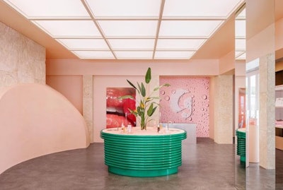 Pictured is the inside of Glossier's new storefront in Miami that they shared on their Instagram page.