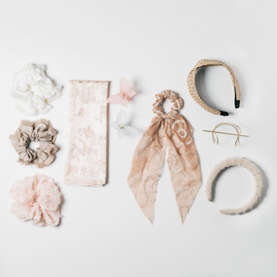 Hairitage’s fashion accessories collection includes butterfly clips, scrunchies, headbands, bun cuffs and a satin head scarf, while its new functional accessories include the Soak It Up Microfiber Scrunchie, designed to reduce dry time and frizz; the Hold My Hair Shower Basket; and the Strike A Pose Handheld Mirror.