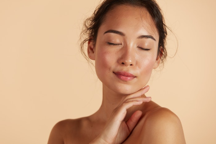 Woman with natural makeup and healthy skin