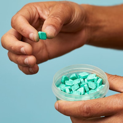 Mouthwash Tabs fizz like a mini bath bomb when placed on the tongue.