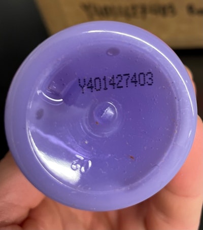 The Alterna Bond Repair Leave-in Heat Protection Spray included in this recall comes in a 4.2 ounce purple plastic spray bottle marked with lot #Y401427403 on the bottom