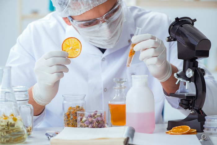Chemist creating perfumes in the lab