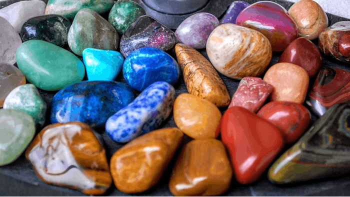 Wellness rocks and crystals zen garden board closeup