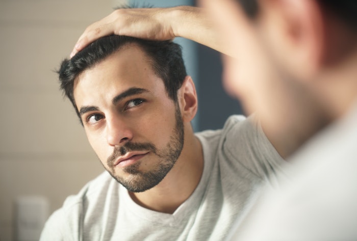 The Daily Mail reports that doctors have found that when the drug is taken as a pill, it is still broken down into the active form that triggers hair growth.