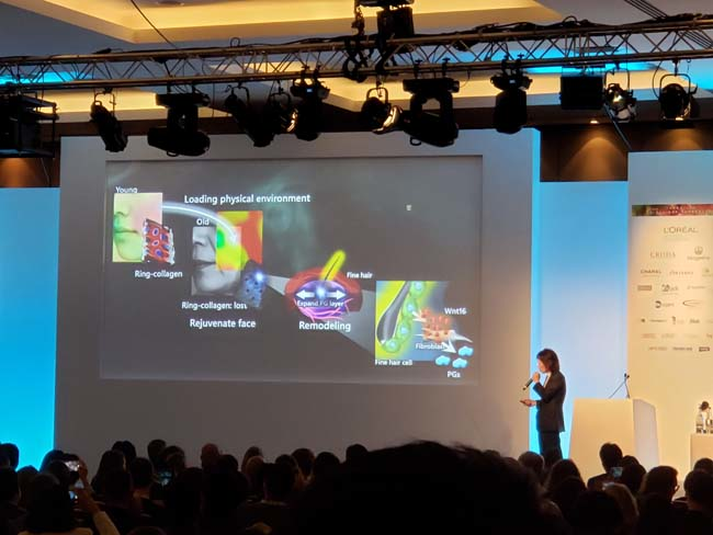 Tomonobu Ezure, of Shiseido, presented a highly engaging video demonstrating how tension differs in skin, the causes of it, and its implications in skin sagging for a novel anti-aging approach. More specifically, he identified how fine hair fibers within the 'voids' of skin collagen 'rings' can remodel the surrounding collagen rings.
