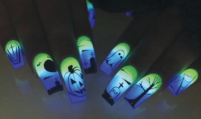 Glow in the dark Halloween nail art designed by Rebecca Ludwig