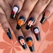 Houston Astros Halloween nail art created by Christie Schobel