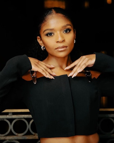 Imarni styled Dominque Thorne's nails in a toffee color for the London premiere of Wakanda Forever.