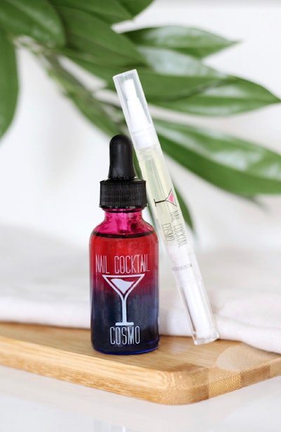 Nail Cocktail cuticle oil in Cosmo, available in 30 ml bottles and portable pens