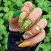Get inspo for St. Patrick's Day with these seven nail designs.