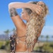 Hair Stylist Ashanti Lation styled LATTO's hair for Coachella using göt2b styling products.