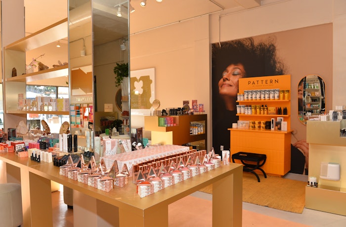 The 1,700 square foot space, featuring bold metallic finishes alongside an inviting lounge area, premieres six brands-in-residence, meant to act as independent retail experiences, .