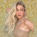 Celebrity hairstylist Dimitris Giannetos created a hair look for Gigi Hadid for the Cannes Film Festival that combines three trends: the heavy side part, Old Hollywood waves and the 90s supermodel blowout.