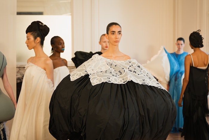 Hairstylist Rutger created the hair looks for the Caroline Hu show during Paris Fashion Week using products from Uberliss.