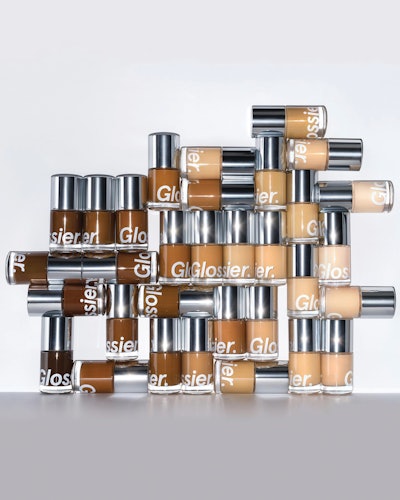 Glossier’s Stretch Fluid Foundation is available in 32 shades balanced across seven families, per the brand.