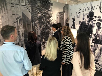 Shown are people touring Shiseido’s heritage at the building in Ginza.