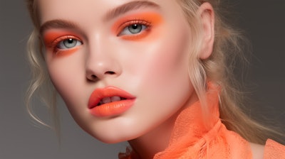 For color cosmetics evoking Pantone 13-1023 Peach Fuzz, Spectra Colors Corp. recommends leveraging organic pigments, FD&C Yellow 6 Allum Lake; image by maxa0109 at Adobe Stock.