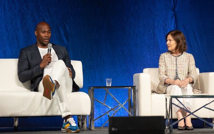 Chris Collins (L) and Linda G. Levy (R) on the World Perfumery Congress 2022 stage.