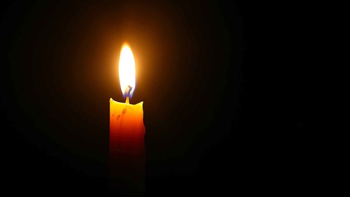 In Memoriam Candle Adobe Stock 248114703
