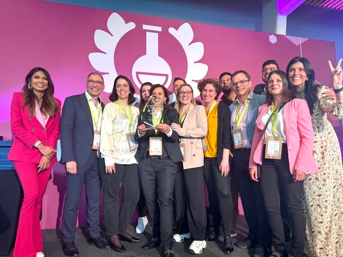 According to DSM-Firmenich, 3% of Eterwell Youth applied for 2 weeks boosts skin smoothness by 24%, 'corresponding to a skin physiological age looking 2 years younger and even 6 years younger after 3 months.' Pictured: the company's team following its win at in-cosmetics Global.