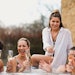 women being social at the spa together.