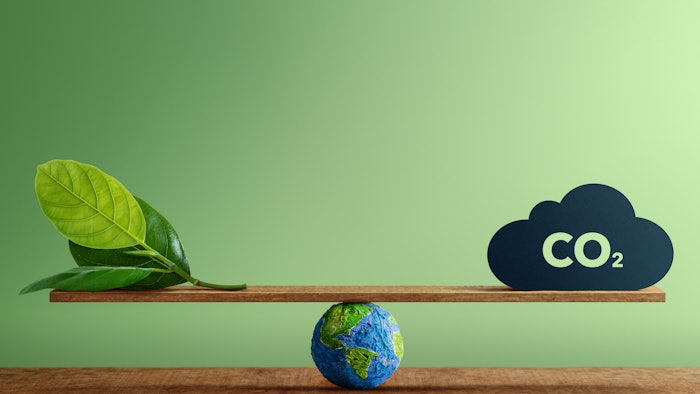 Carbon Neutral and ESG Concepts. Carbon Emission, Clean Energy. Globe Balancing between a Green leaf and CO2. Sustainable Resources, Big deal for Company and Indstry to Concern about Environmental