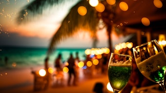 celebration on beach lights palms champagne toast