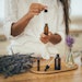 Woman performing aromatherapy with essential oils