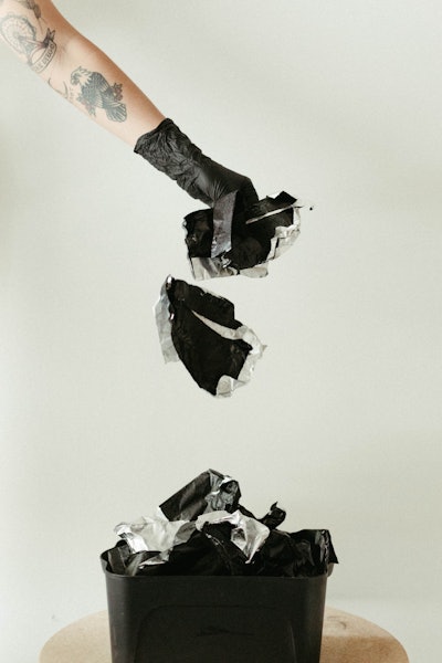 Stylist recycling hair foils at their salon.