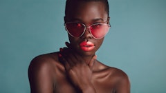 Beautiful Black Woman Wearing Bold Makeup And Fun Sunglasses Adobe Stock 346803986