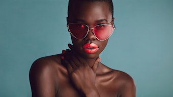 Beautiful Black Woman Wearing Bold Makeup And Fun Sunglasses Adobe Stock 346803986