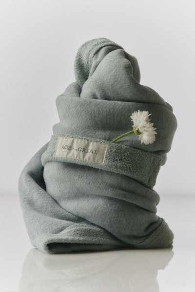 The Sweatshirt Hair Towel is an innovative design that brings effortless, California ease to your air dry.